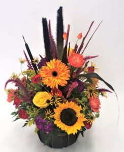 orange and yellow fall flowers with purple and green accents 