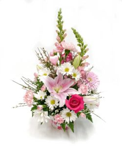Send your love to that special valentine with our "From The Heart" bouquet. Lilies, roses, Gerbera daisies, carnations and filler arrive in a decorative heart accented pail with a Valentine's Day pick.